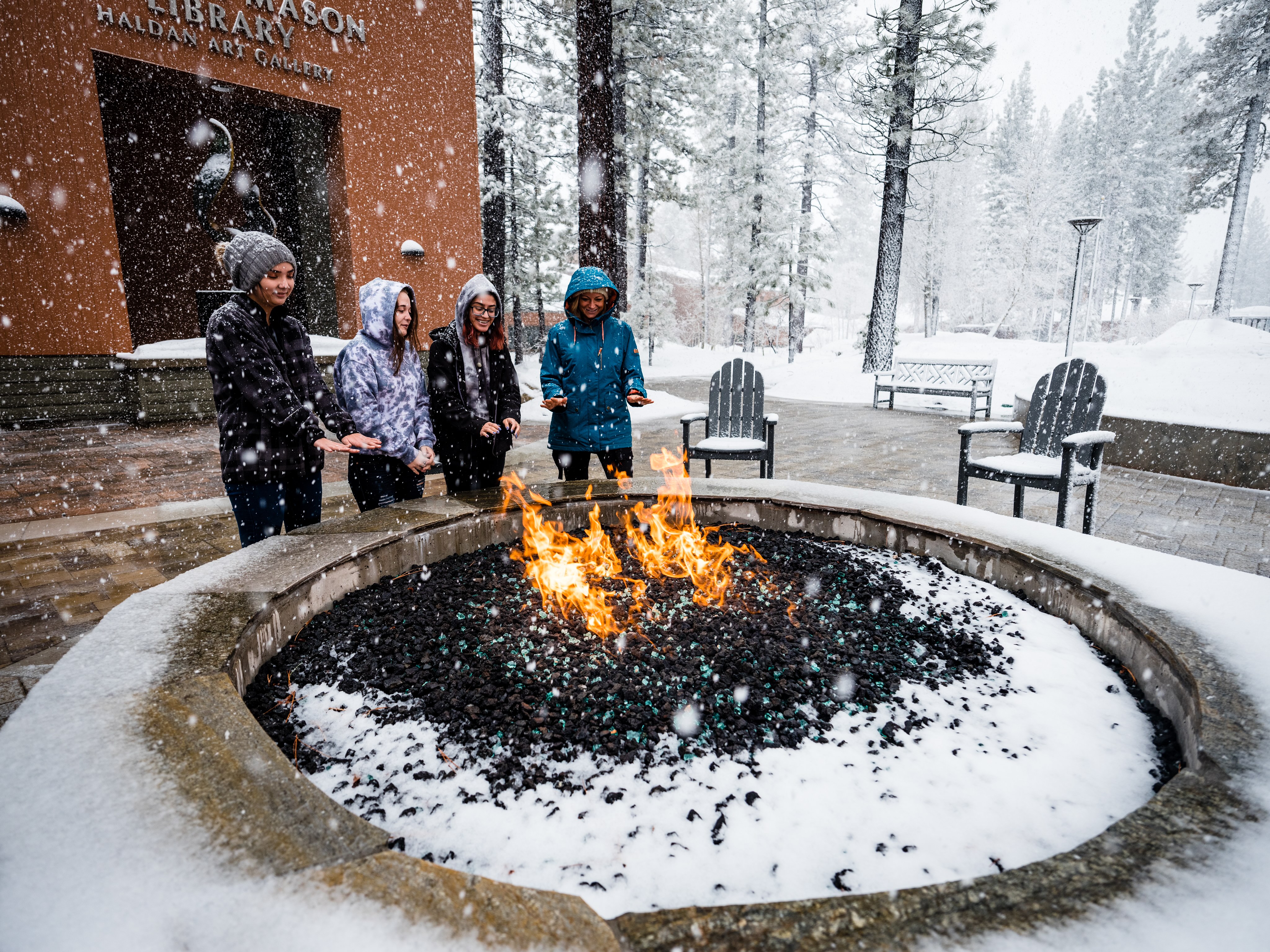 Students around fire pit