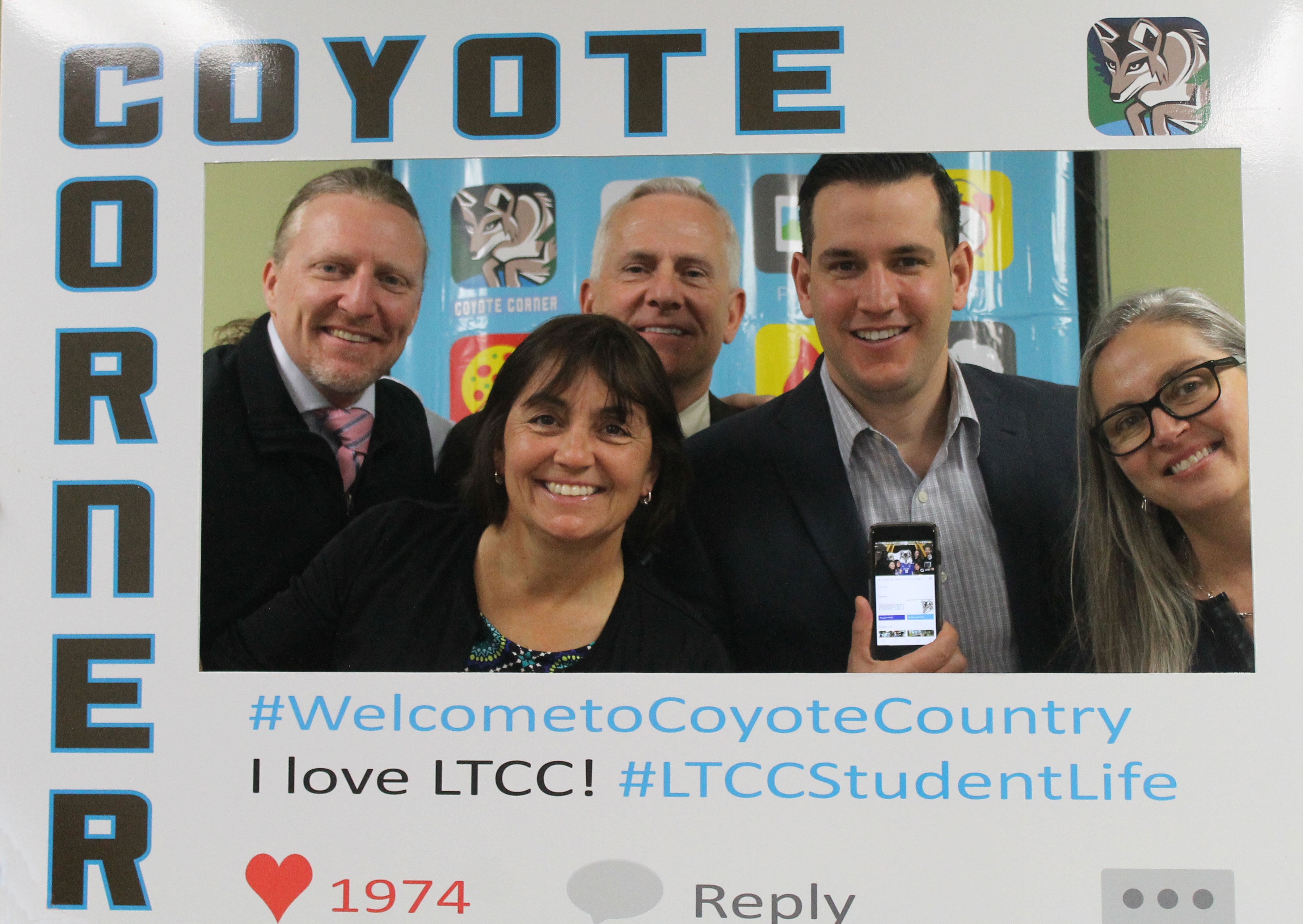 LTCC's administrative team with the Coyote Corner frame