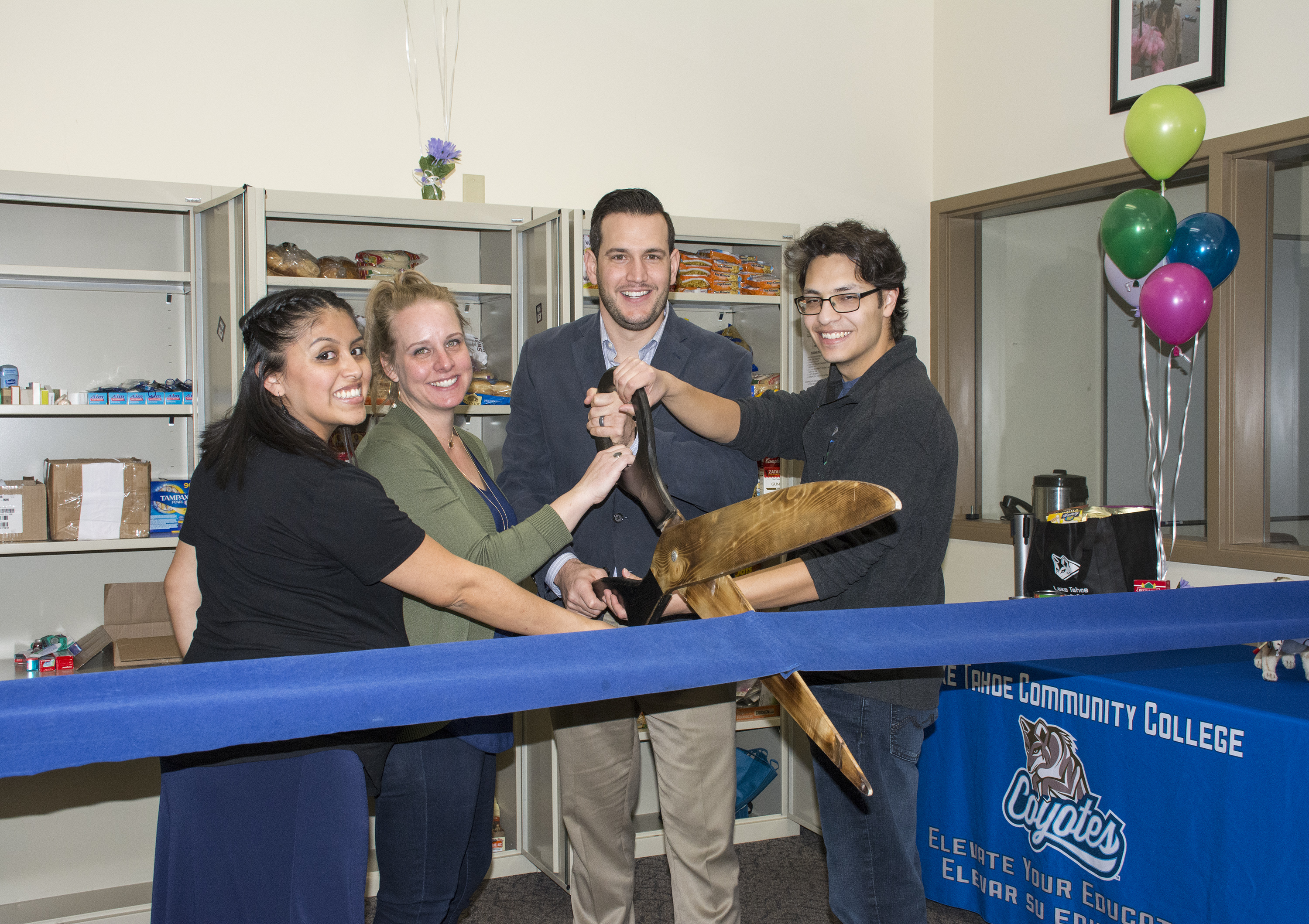 Equity Director Laura Salinas, Student Life coordinator Julie Booth, LTCC President Jeff DeFranco and LTCC Student Trustee Morgan Montoya cut the ribbon on LTCC's new food pantry