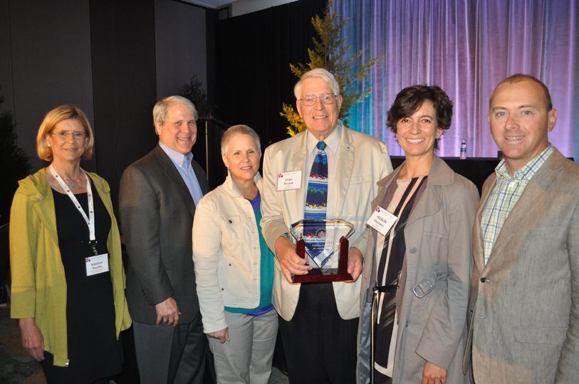 LTCC's Board of Trustees with Dr. Wenck as he receives an award from the Community College League for 40 years of service