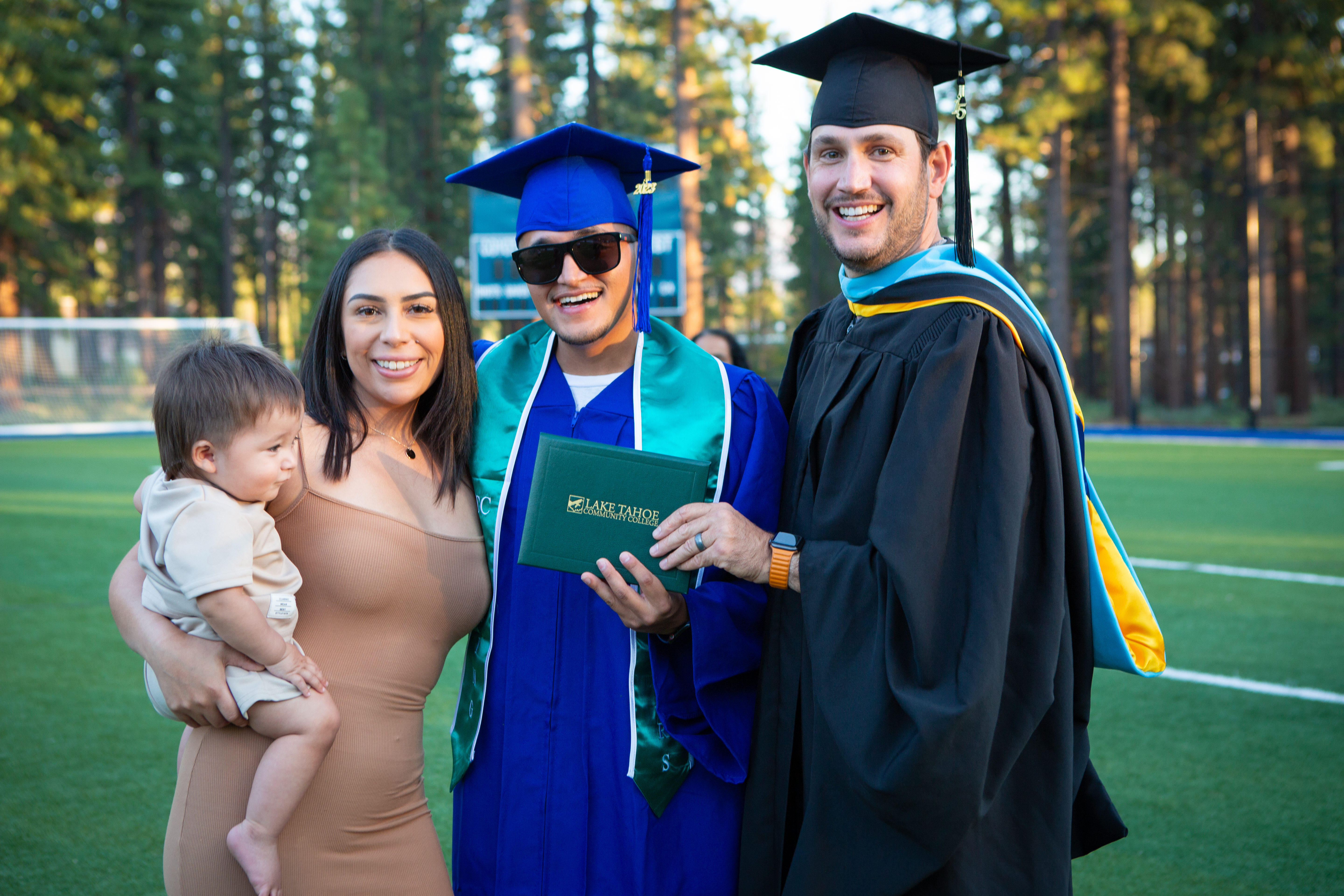 LTCC graduate with his family and President Jeff DeFranco