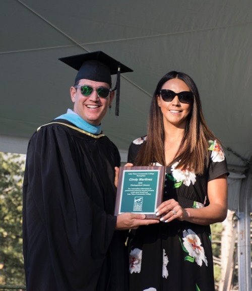 Presdient Jeff DeFranco presenting Cindy Martinez with the 2018 Distinguished Alumni Award