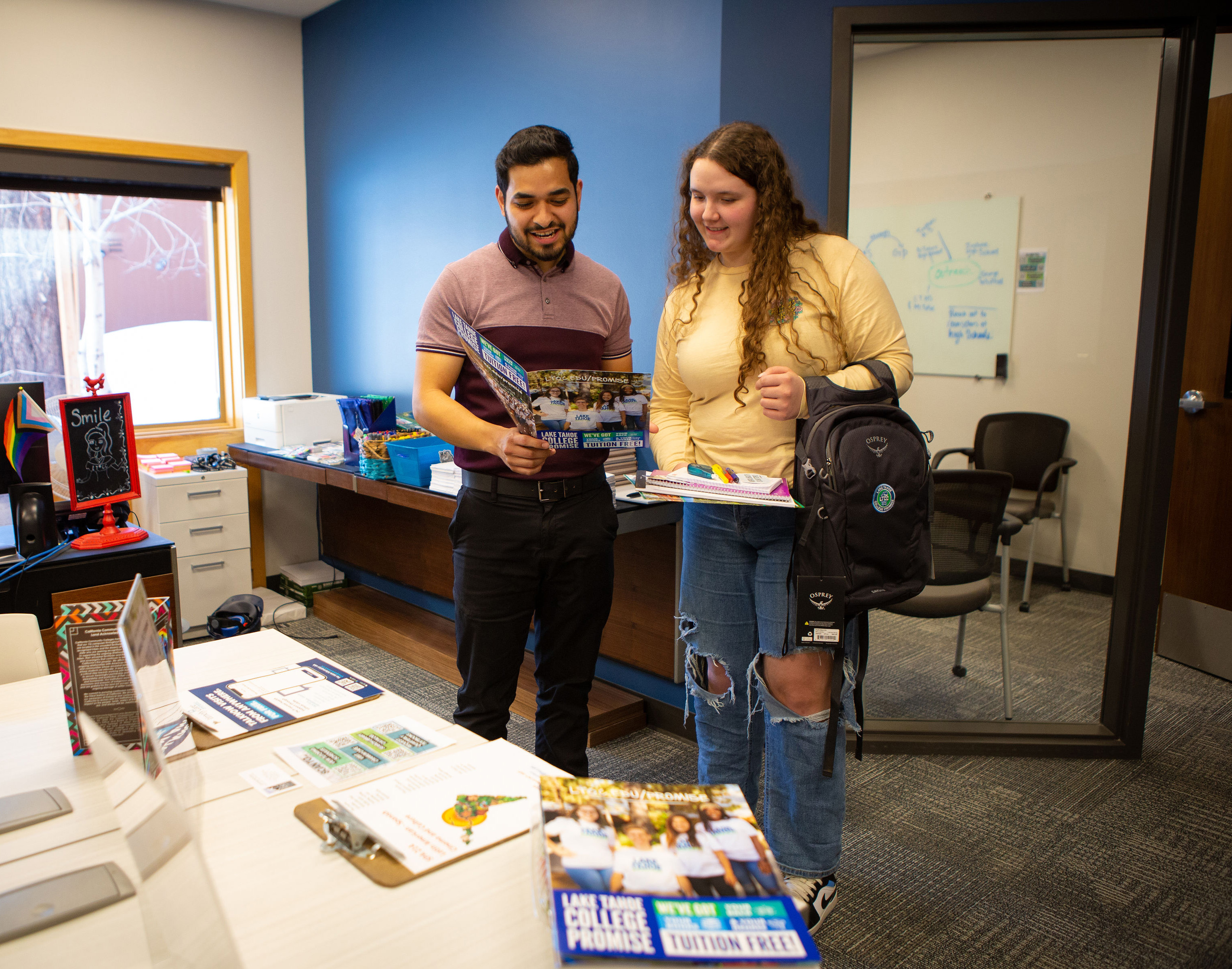 Lake Tahoe College Promise Director with student in the Promise Office