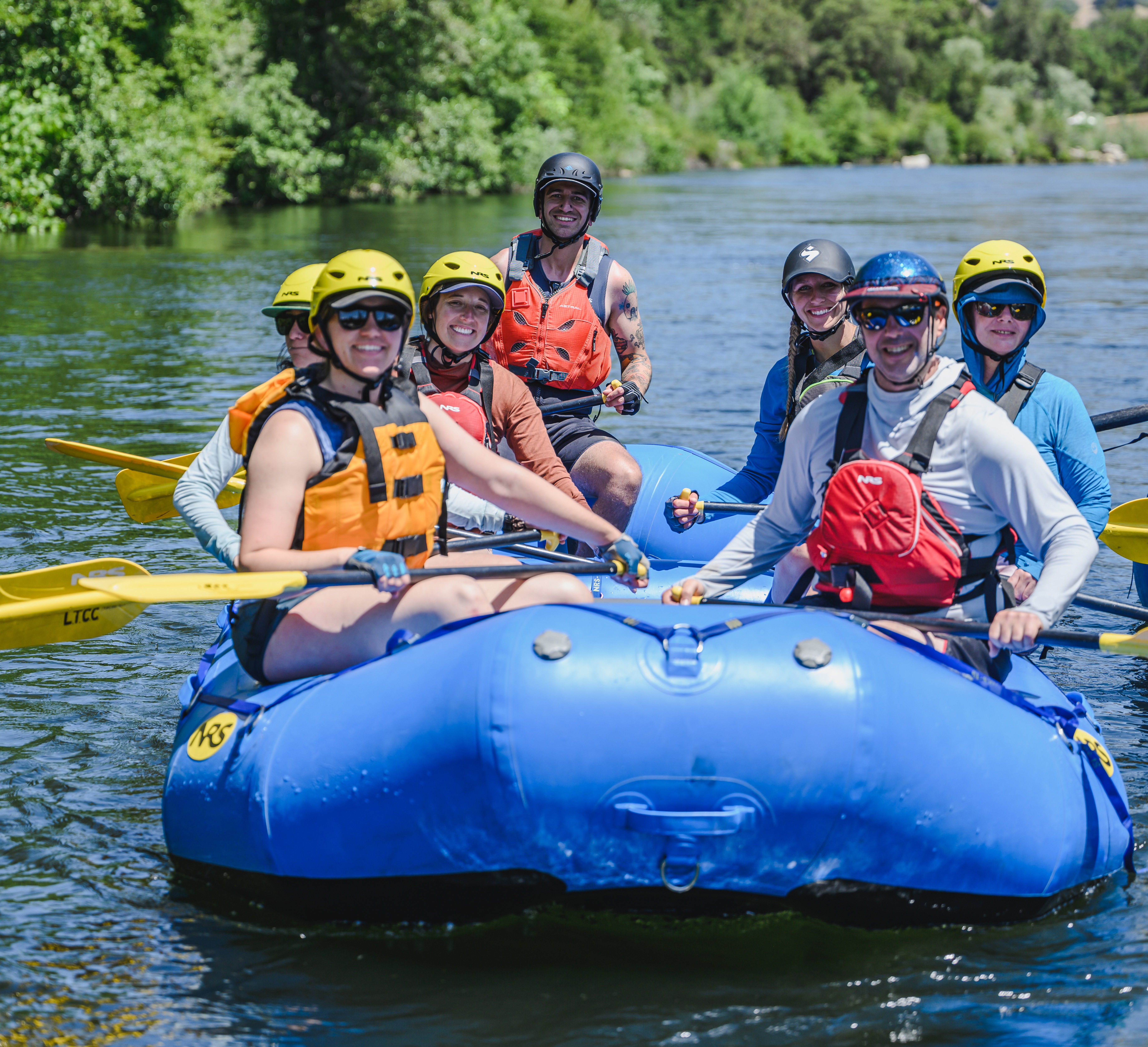 Group of people white water rafting on the American River