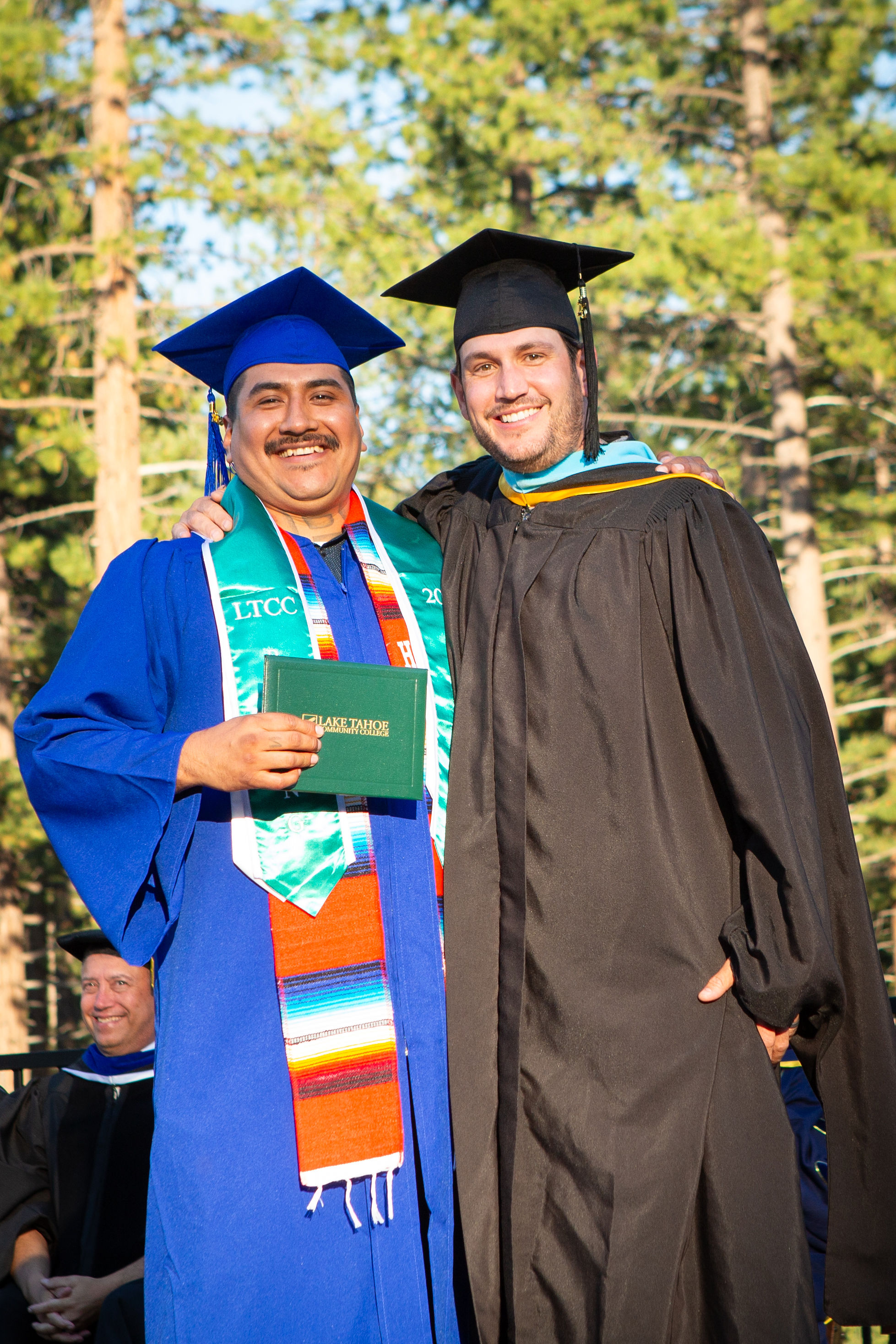 One of LTCC's seven graduating RSP students receiving his diploma from President Jeff DeFranco
